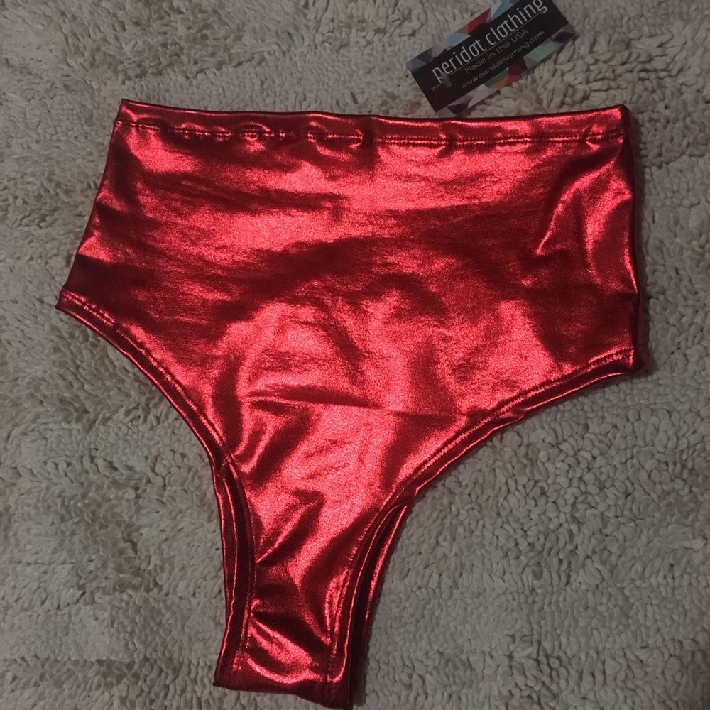 High cut, high waisted metallic red shorts.